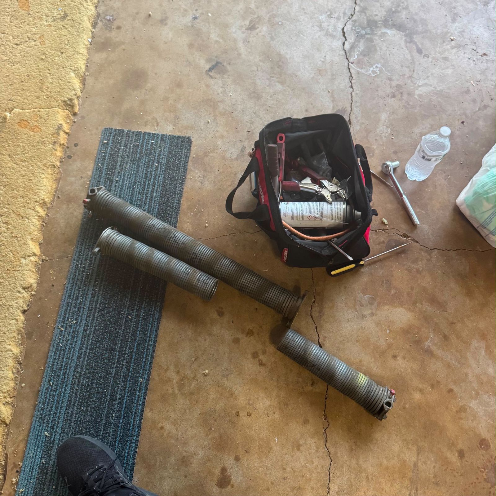 Broken springs removed — DFW - Fast Mobile Garage Doors