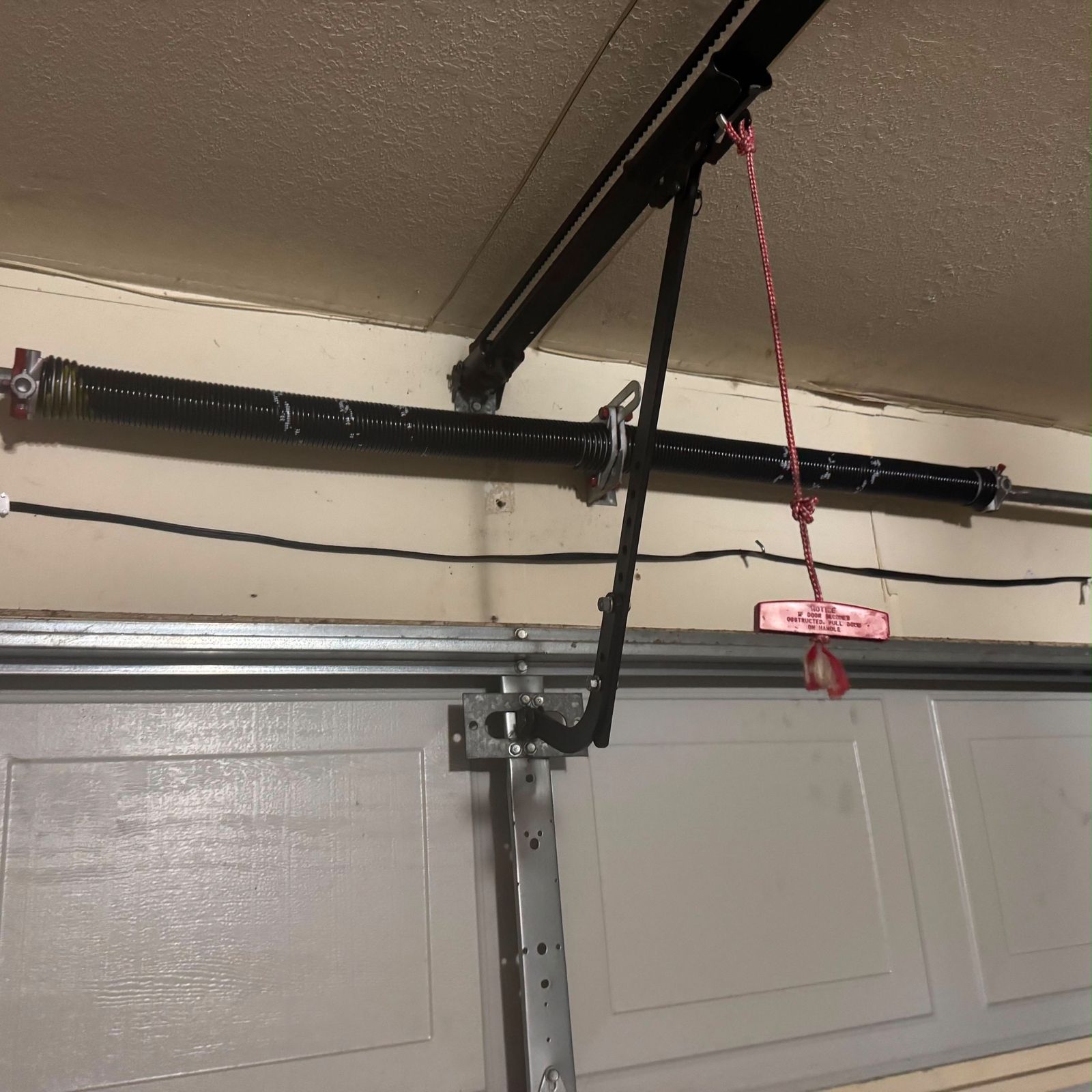 Broken spring repair — DFW - Fast Mobile Garage Doors