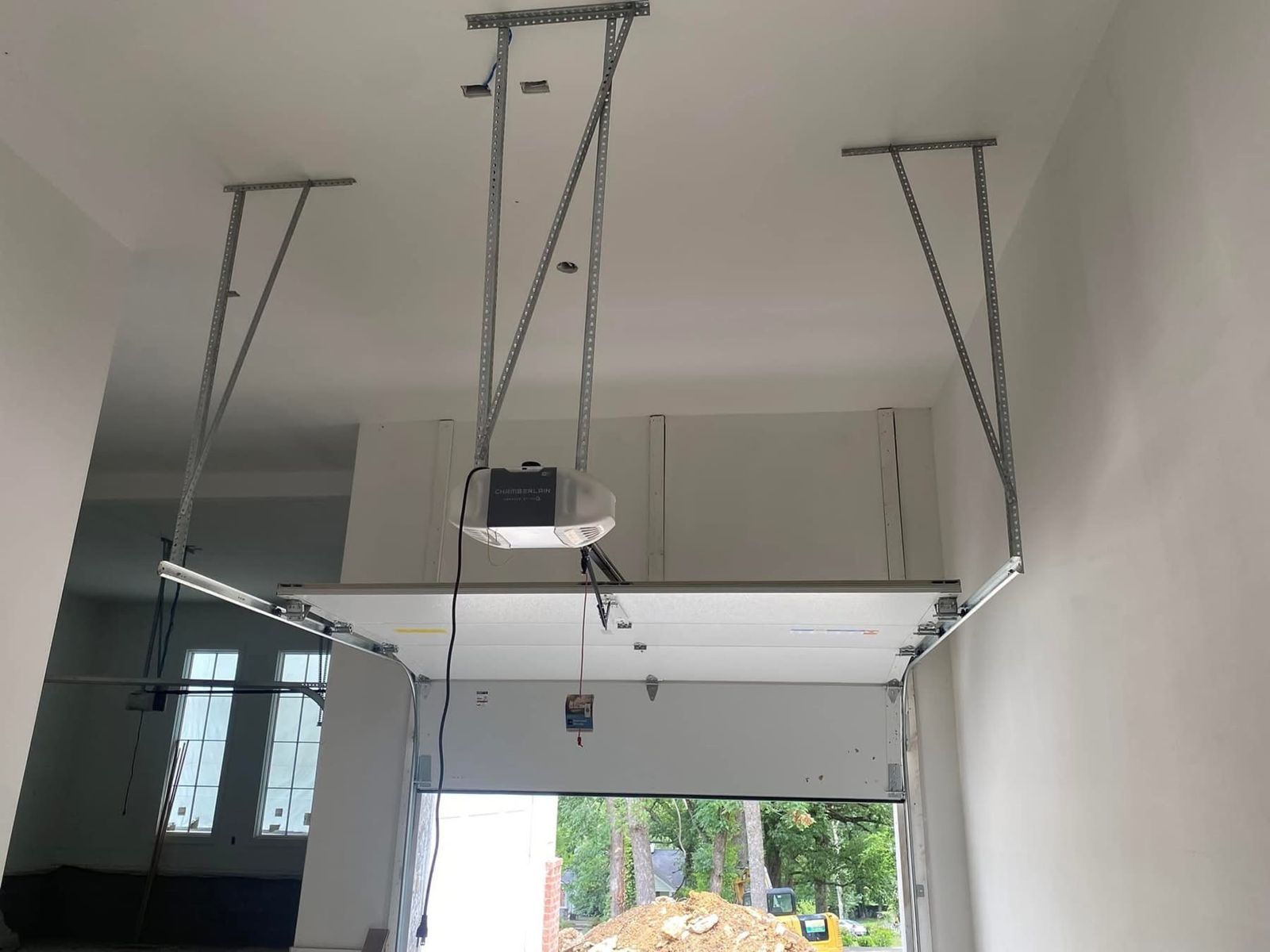 Chamberlain opener installed in a new construction garage in DFW