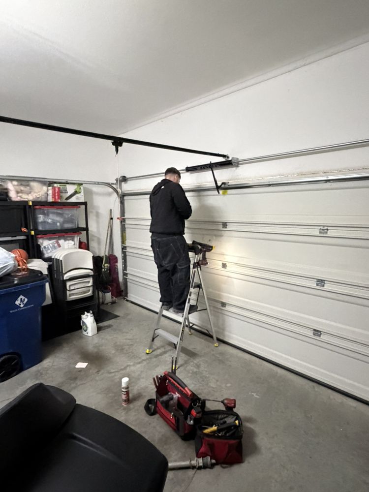 Garage door spring and track repair DFW